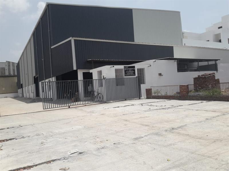 Warehouse with an attached office block and concreted yard