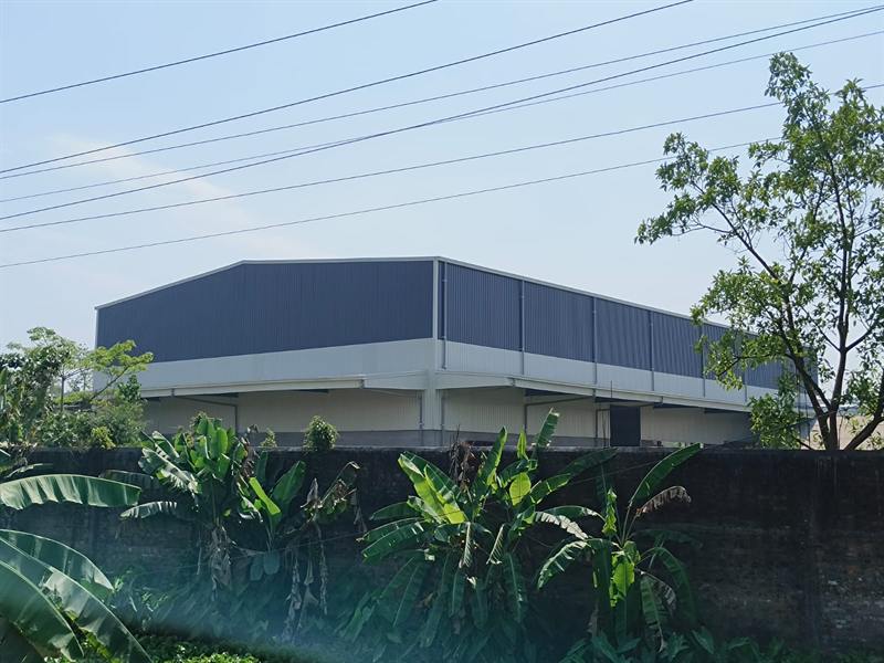 Full elevation of a completed long-span warehouse